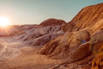 Rugged landscape with red dirt hills
