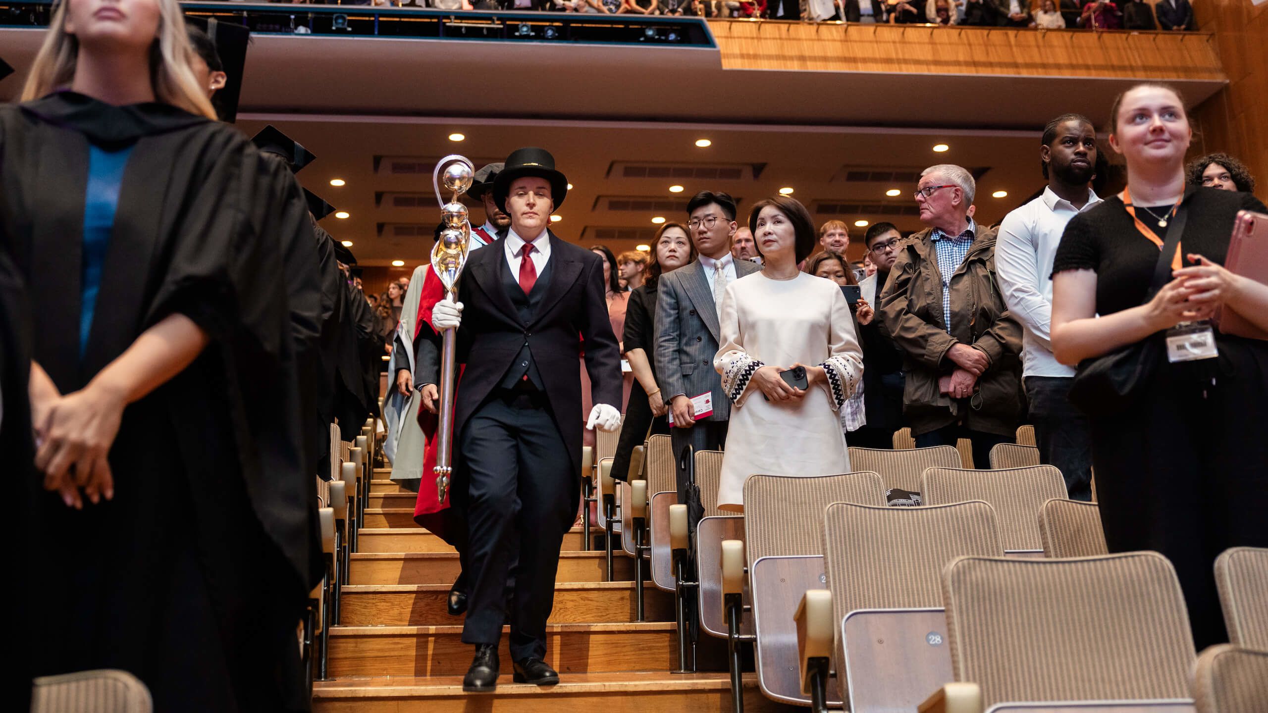 The Mace being carried down stairs