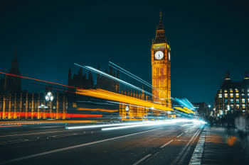 Westminster, London at night with time-lapse traffic